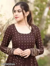 Women's rayon long Anarkali gown with zari woven pattern, three-quarter sleeves. Rayon, vibrant print, Indian fashion